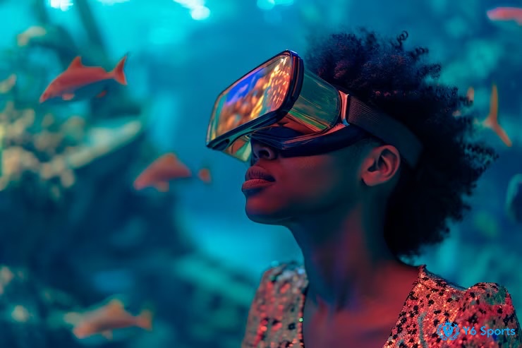 Người chơi có thể đeo kính VR trải nghiệm game bắn cá, với hình ảnh đại dương ảo sống động và cá bơi xung quanh.